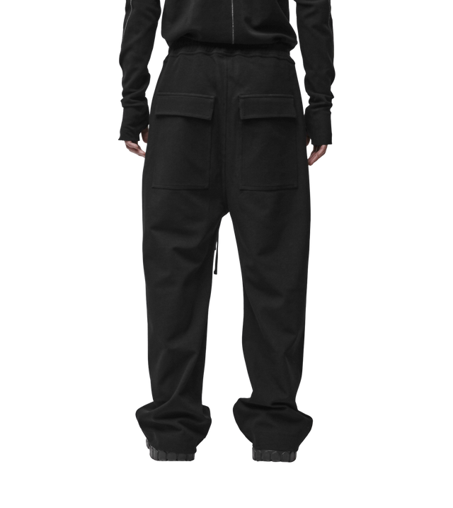Weite Hose mit tiefem Schritt und Kordelzug