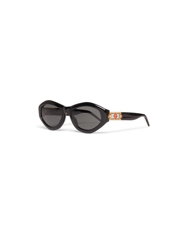 Vergoldete Sonnenbrille mit Monogramm-Plakette