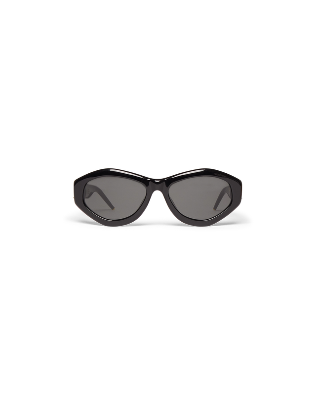 Vergoldete Sonnenbrille mit Monogramm-Plakette