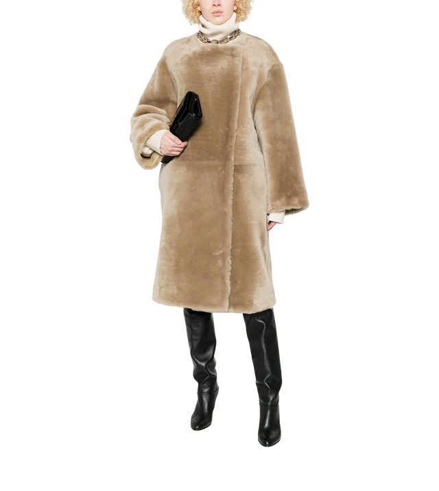 Collarless shearling coat
