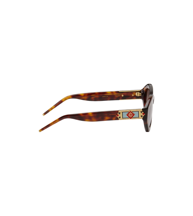 Vergoldete Sonnenbrille mit Monogramm-Plakette